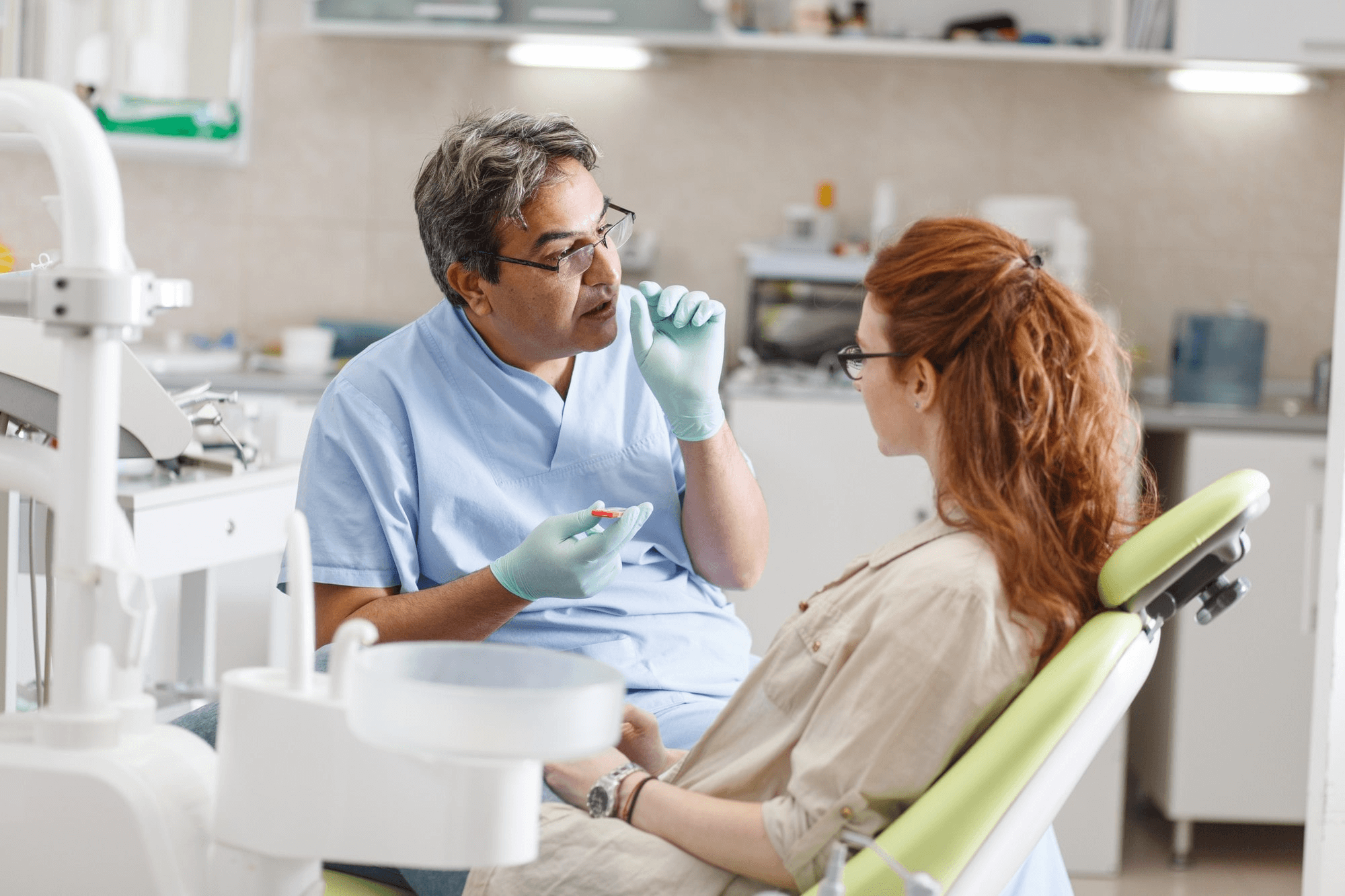 Dentist Giving a Dental Advice to Patient